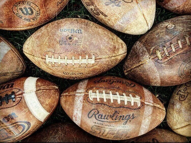 Repurposing old footballs turns into idea for ball caps